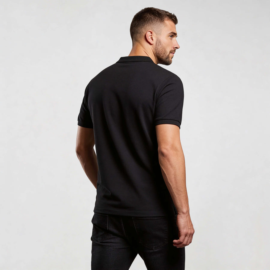 Alt Tag: Core Polo Shirt CO001 polo shirt by MEXESS in black, back view of men’s organic cotton short-sleeve polo
