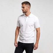 Core Polo Shirt CO001 mens white polo shirt by MEXESS, minimalist organic cotton short-sleeve polo on model