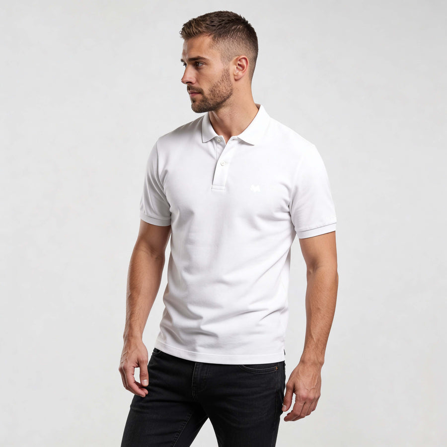 Core Polo Shirt CO001 mens white polo shirt by MEXESS, minimalist organic cotton short-sleeve polo on model