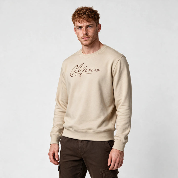 Three-quarter front view of the beige crewneck sweatshirt with signature print
