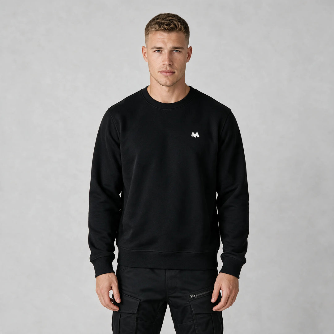 Front view of the black sweatshirt with a small white M logo on the left chest