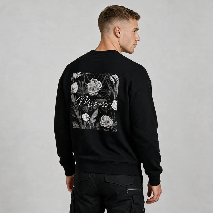 Flower sweatshirt for men in black with a grey rose and leaf back print, seen from the back at an angle