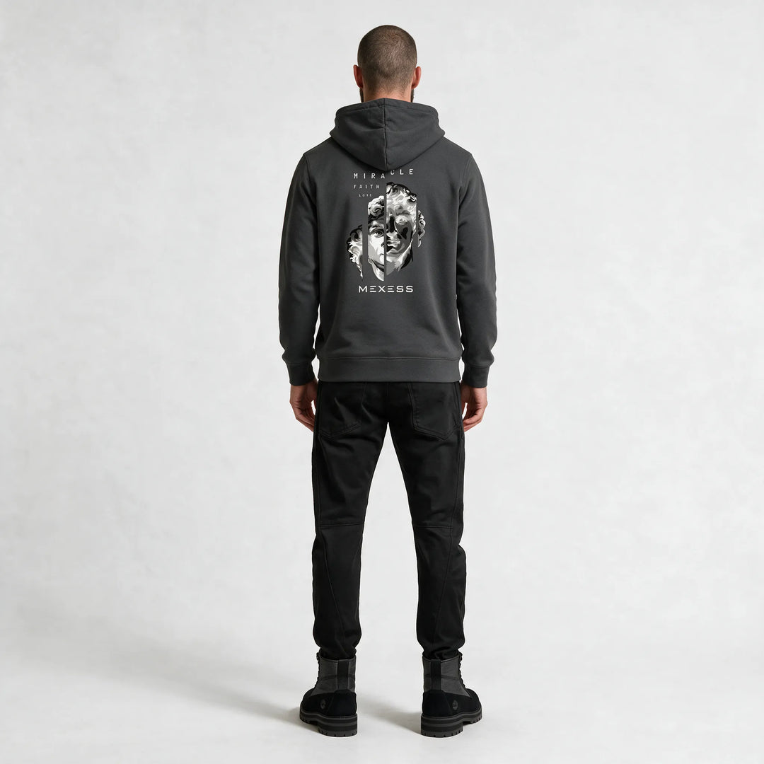 Full-length back view of the dark gray hoodie with the statue print