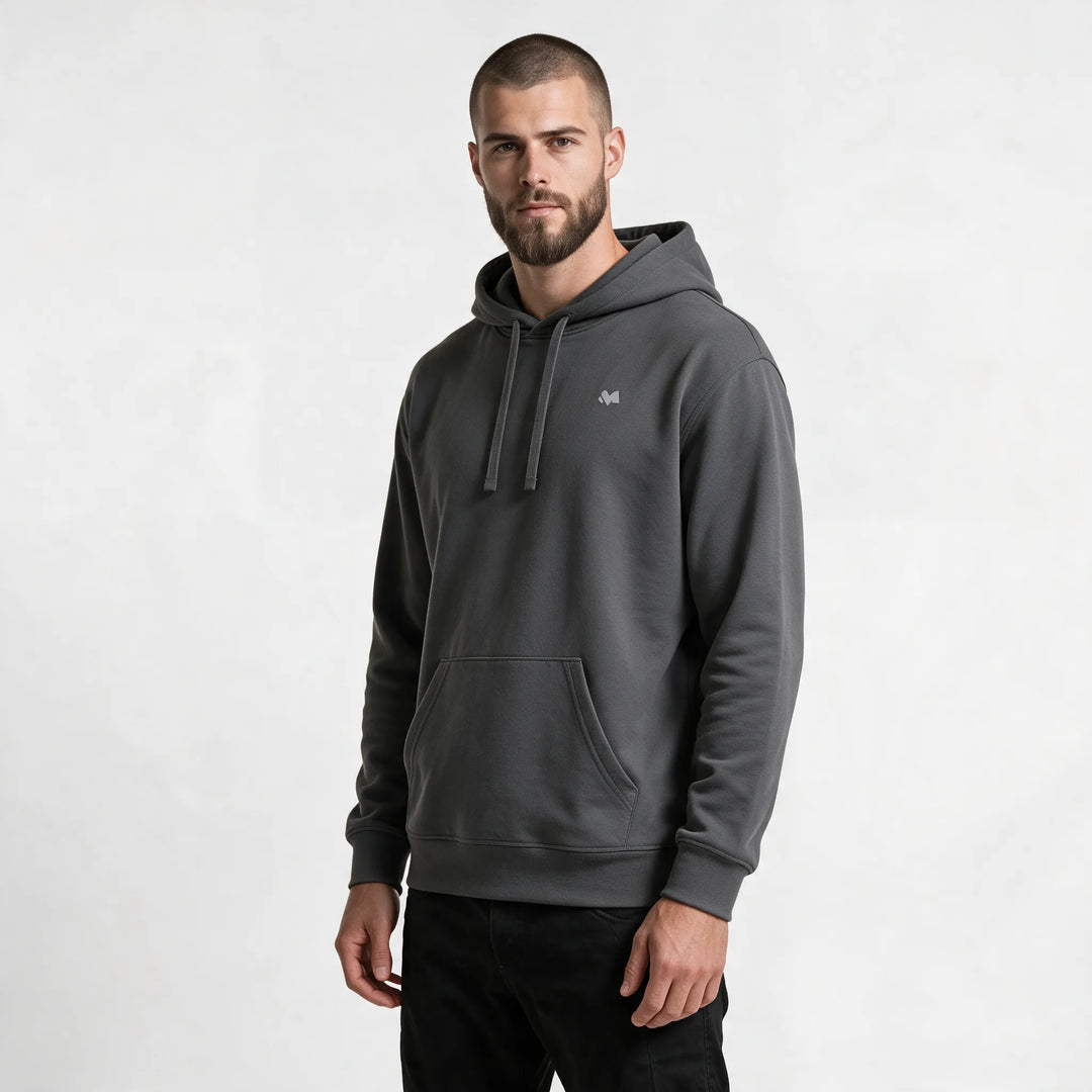 Three-quarter front view of the dark gray hoodie with a small white chest logo