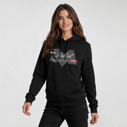Woman wearing Iconic Streetwear Hoodie DR667 by MEXESS in black, showcasing streetwear hoodie style with graphic detail.