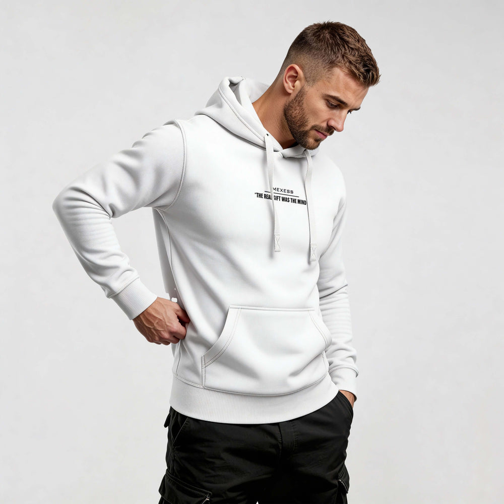 Man wearing Iconic Streetwear Hoodie DR694 with minimalist front branding, in a modern urban style, made from premium organic cotton.