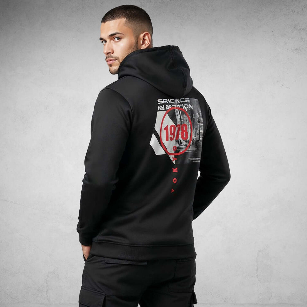 Man wearing Iconic Streetwear Hoodie DR709 with bold graphic design, showcasing premium organic cotton material.