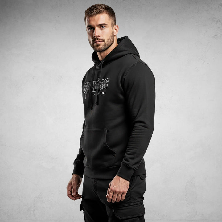 Man wearing Iconic Streetwear Hoodie DR710 by MEXESS, made from organic cotton, showcasing a clean and minimalist design.