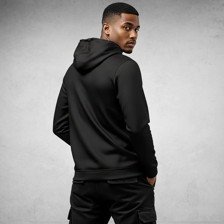 Model wearing Core Streetwear Hoodie DR680 in black, showcasing modern design and comfort. Perfect example of a streetwear hoodie.