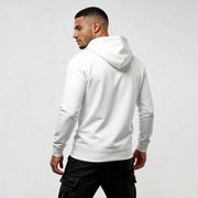 Man wearing Iconic Streetwear Hoodie DR720 in white, showcasing modern design, comfort, and style. Perfect addition to contemporary wardrobes.