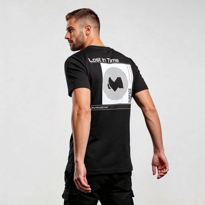 Model wearing Iconic Streetwear T-shirt CR722 with graphic design on back, made from organic cotton.