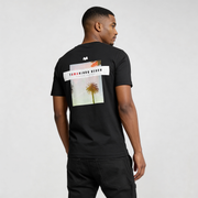 Back view of Tamarindo Beach graphic streetwear t-shirt CR726 black tee with palm print, premium organic cotton street style