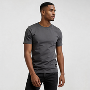 Alt Tag: streetwear t-shirt Tamarindo Beach CR726 premium organic cotton graphic tee in charcoal gray worn by male model