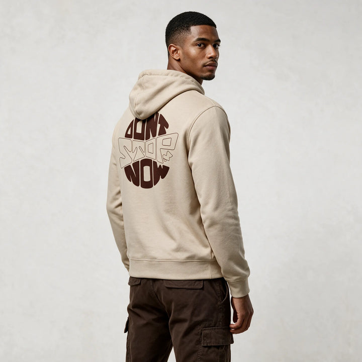Beige hoodie, side-back view with the round DON&