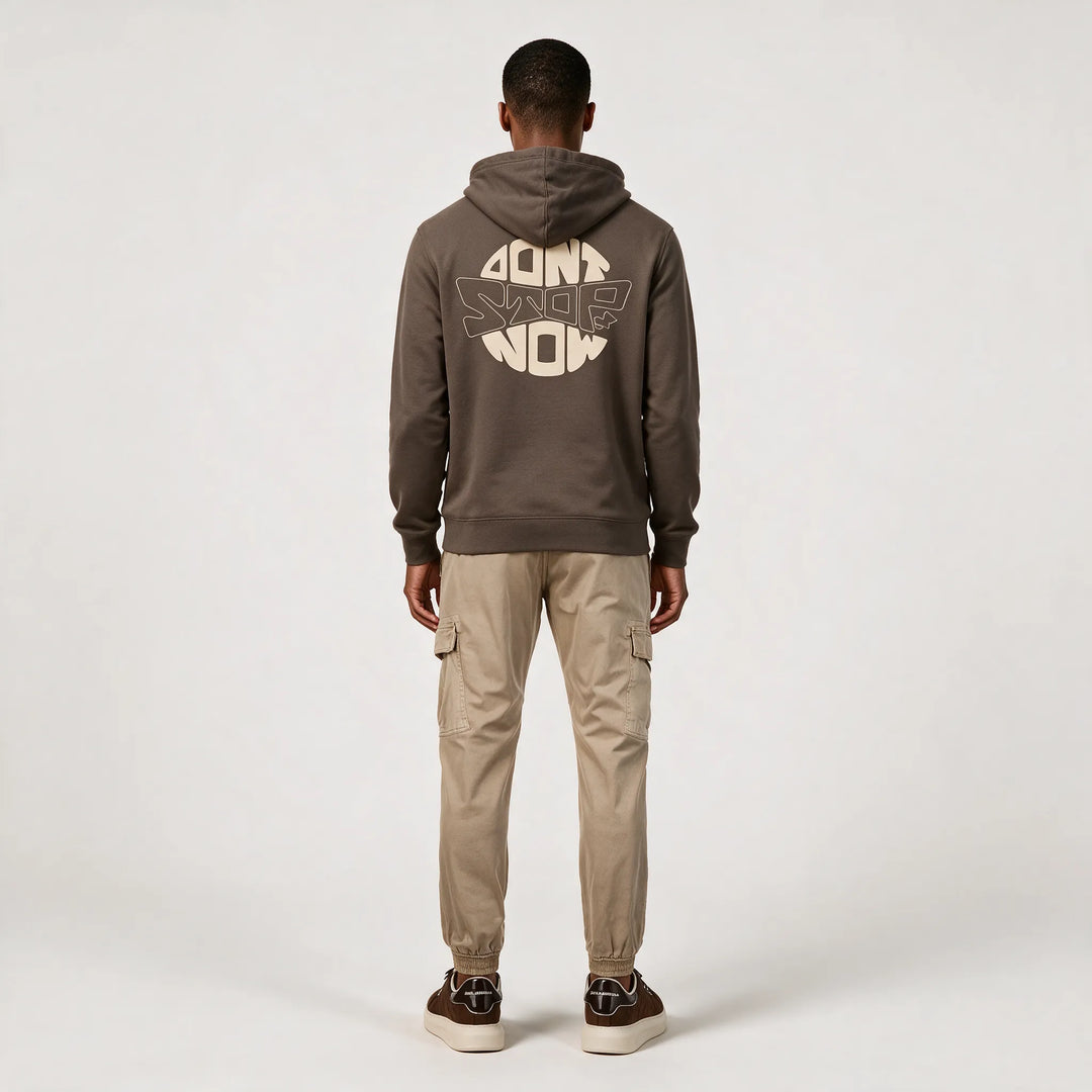 Full-length back view of the mocha hoodie with the round beige DON&