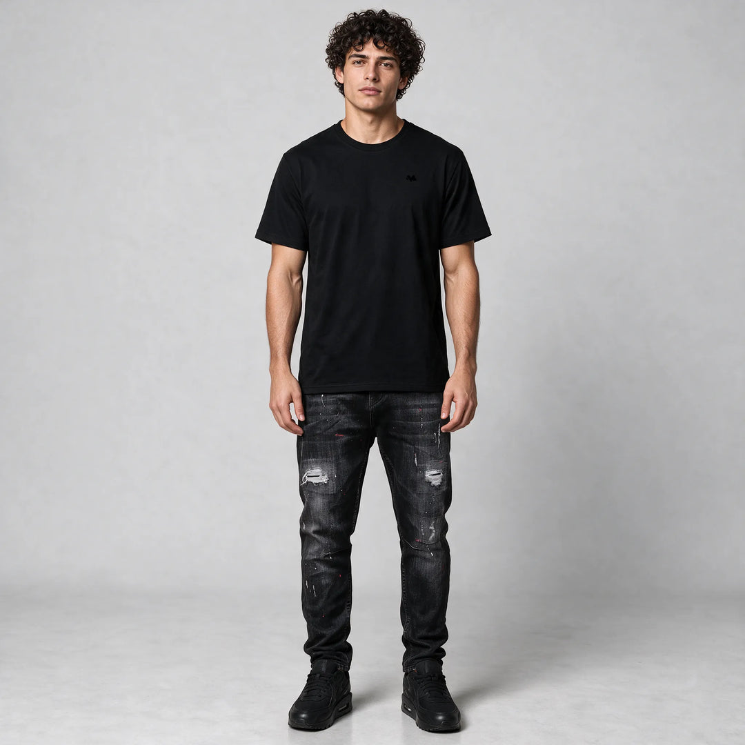 Full-length front view of the black t-shirt in a regular fit