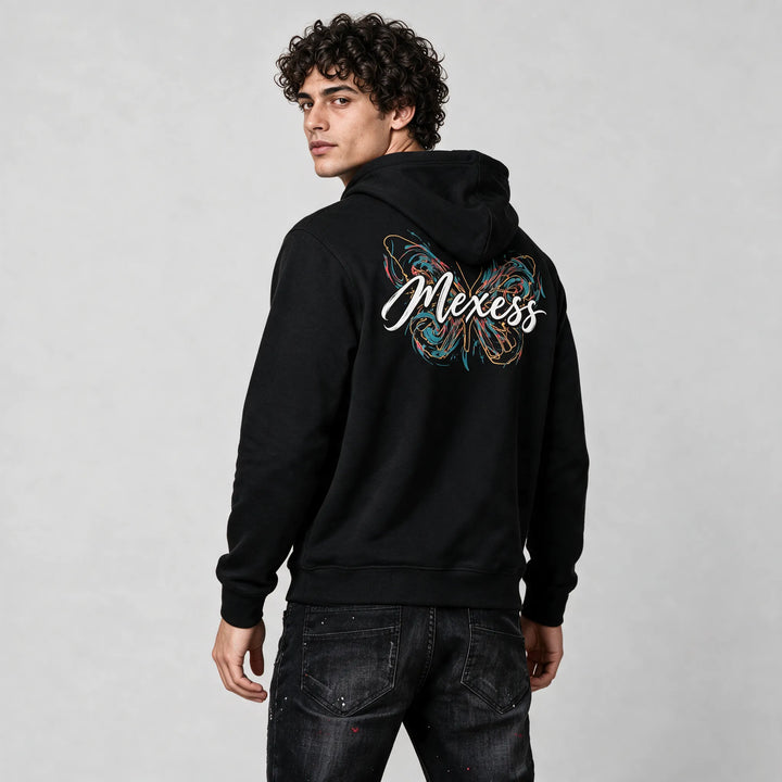 Butterfly script hoodie in black, three-quarter back view with a line-art butterfly and white Mexess lettering