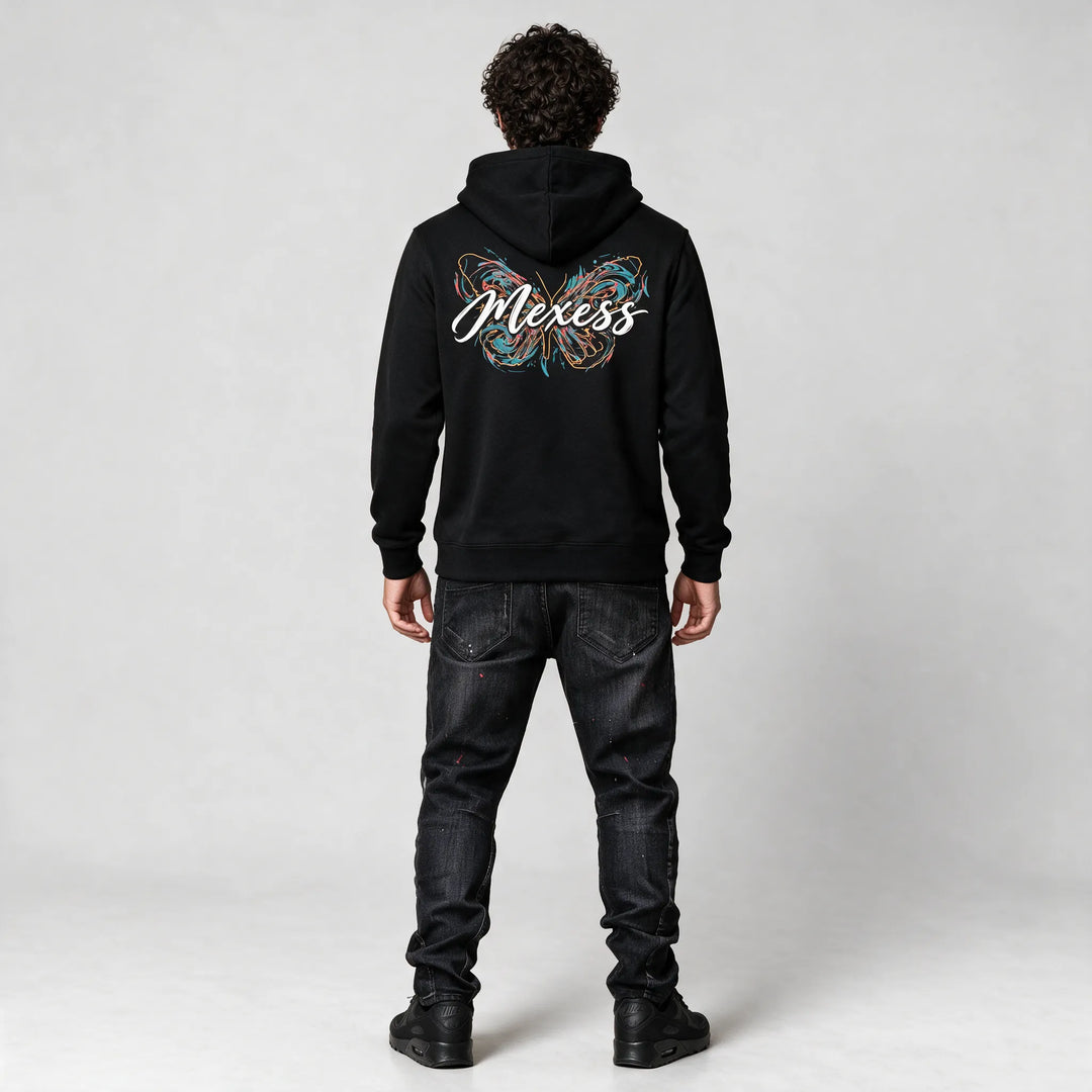 Full-length back view of the black hoodie with the butterfly and Mexess script print
