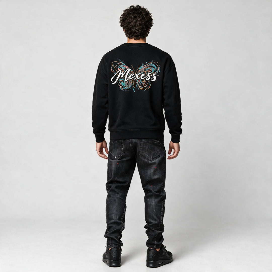 Full-length back view of the black sweatshirt with the butterfly and script print
