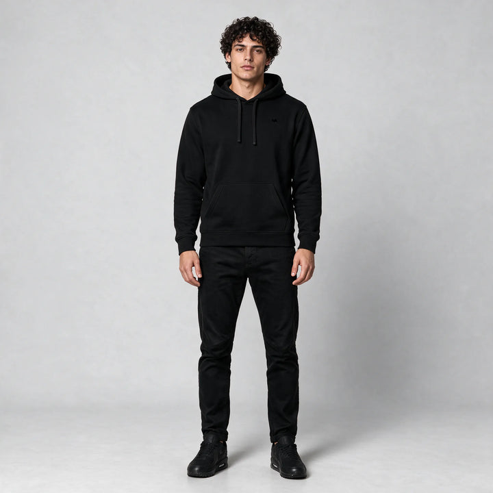 Full-length front view of the black hoodie