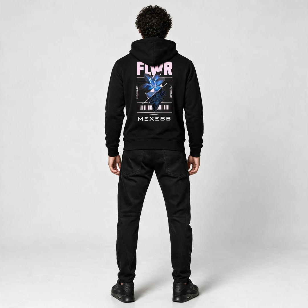 Full-length back view of the black hoodie with the flower print