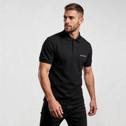 Alt Tag: Core CO689 polo shirt by MEXESS in black, men’s minimalist short-sleeve collared top for smart-casual wear