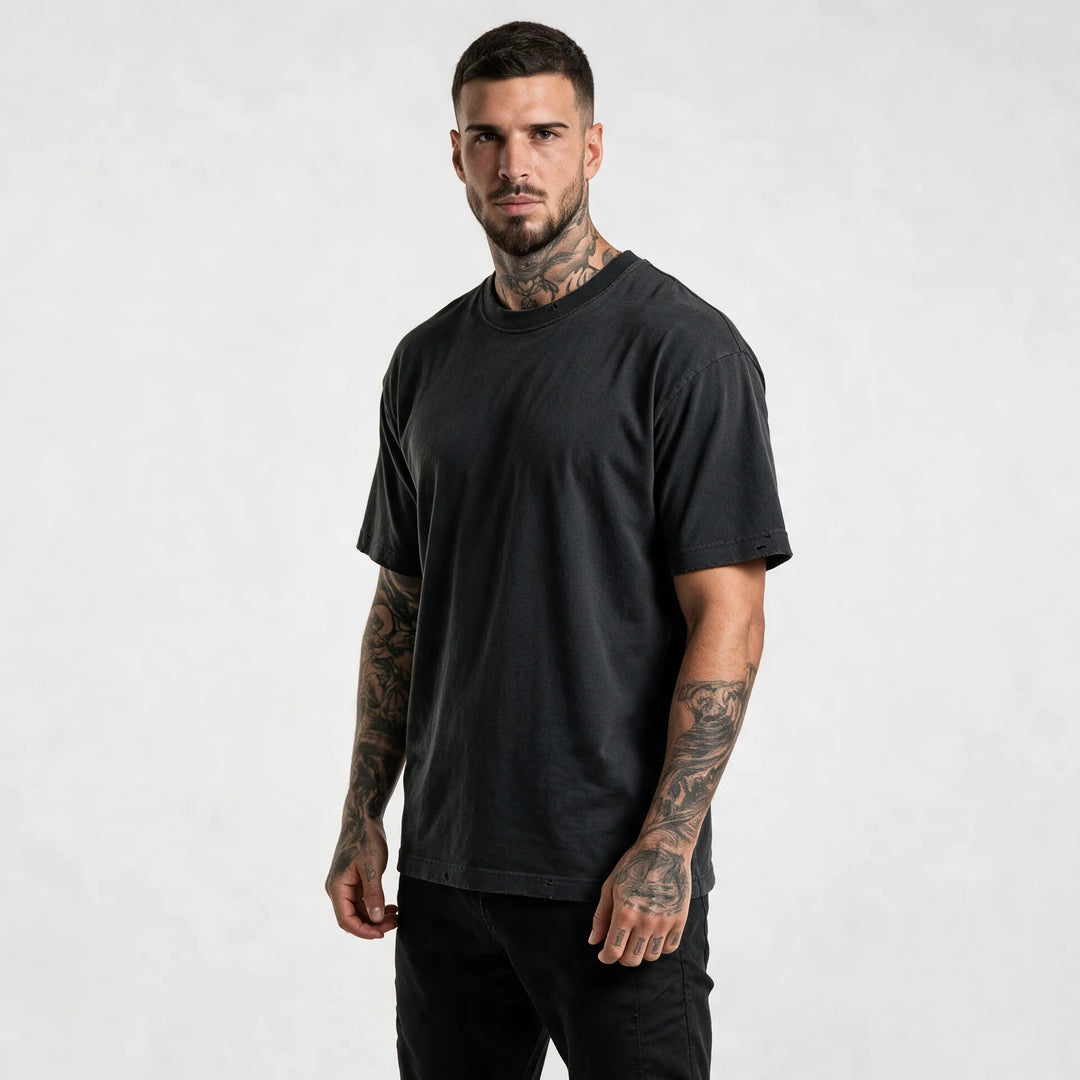 Three-quarter front view of the washed black heavyweight t-shirt