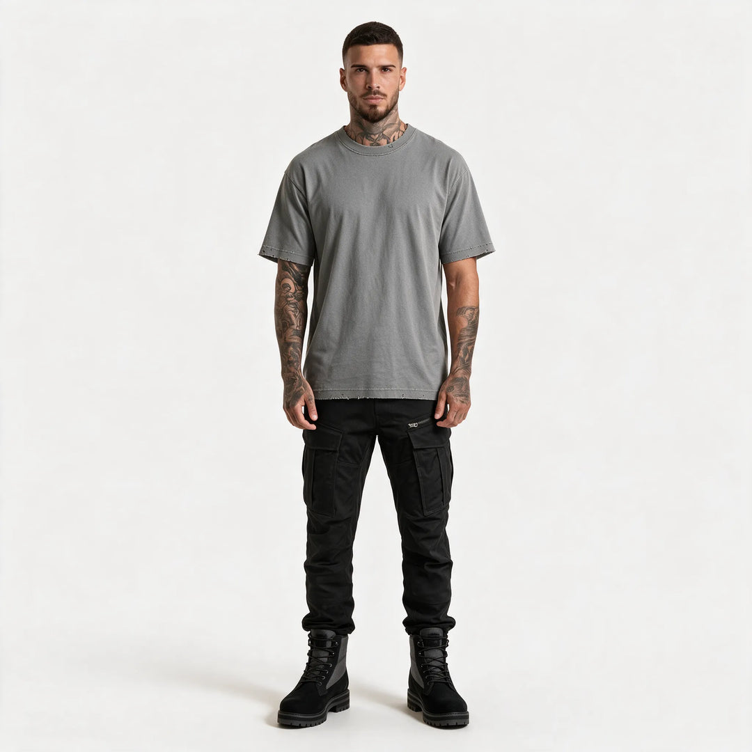 Full-length front view of the gray t-shirt with black trousers