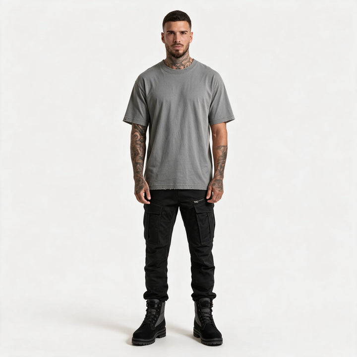 Full-length front view of the gray t-shirt with black trousers