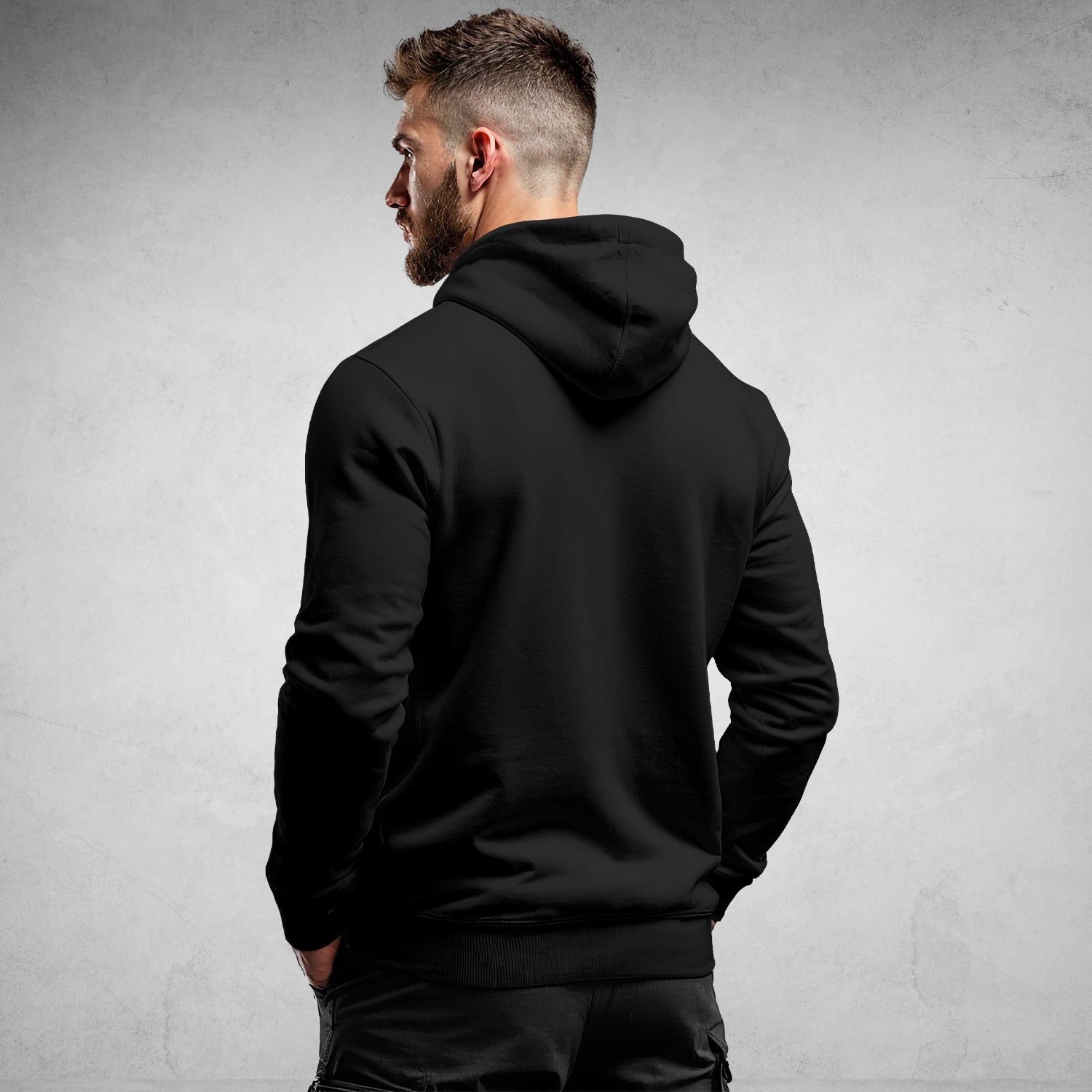 MEXESS Men's Organic Cotton Hoodie black back view on male model, fitted hood, ribbed cuffs, casual fit