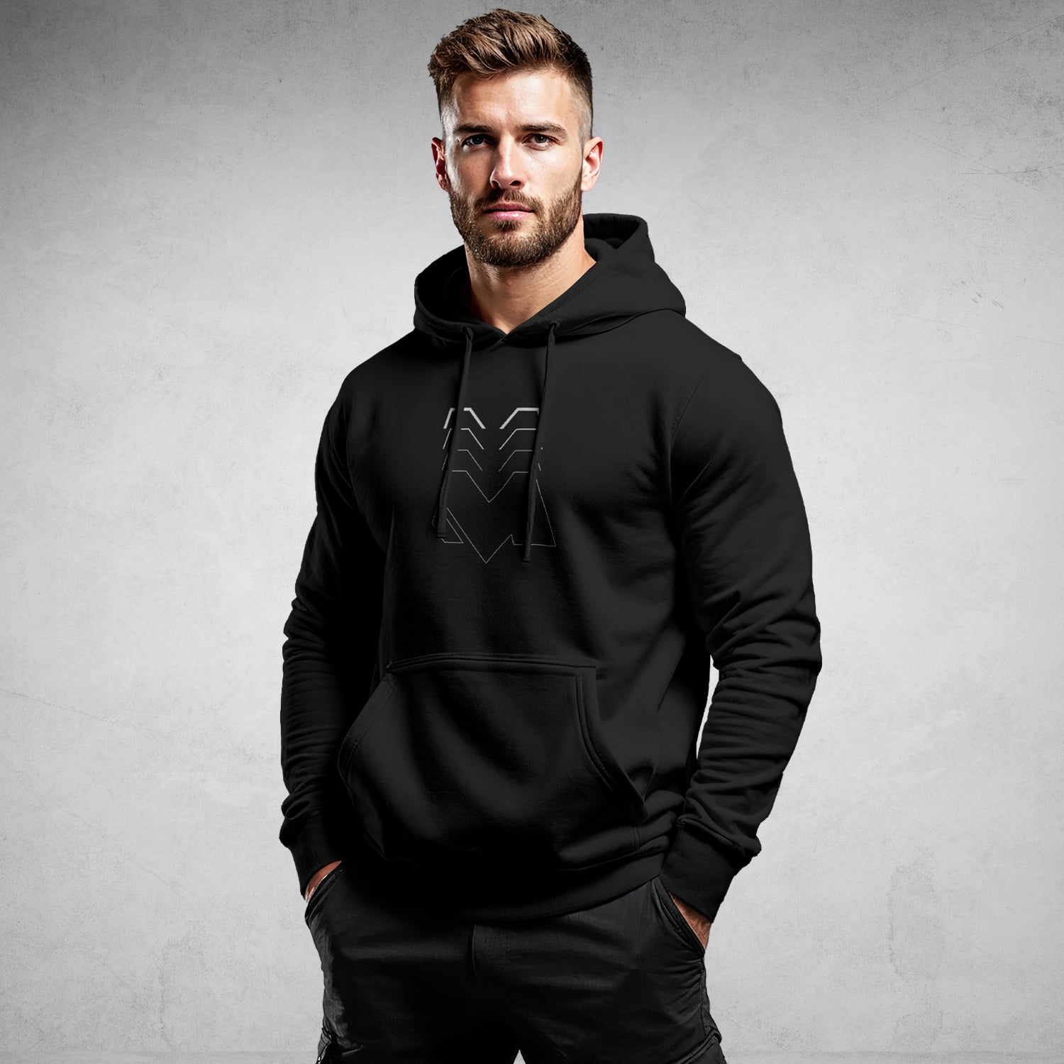 MEXESS Men's Organic Cotton Hoodie black slim fit on male model with hood front logo and kangaroo pocket