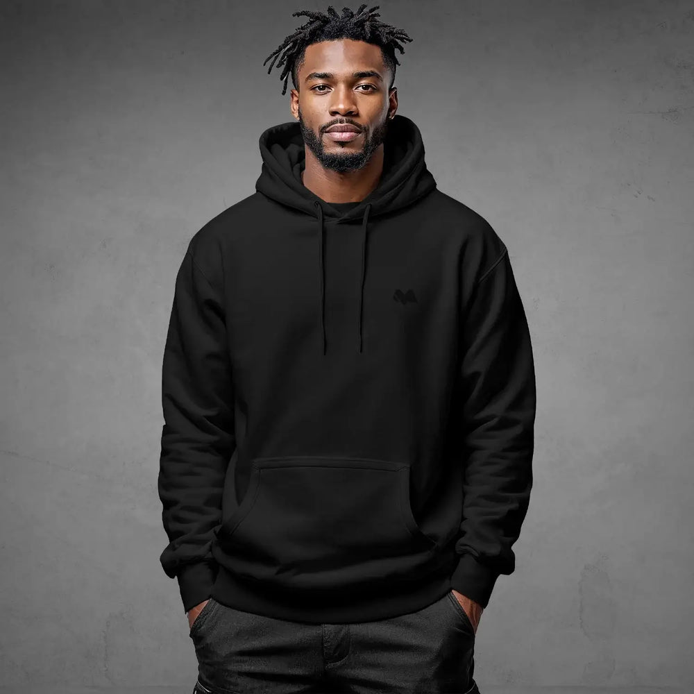 Alt Tag: Iconic Streetwear Hoodie DR669 black organic cotton pullover hoodie for men, front view model wearing streetwear sweatshirt