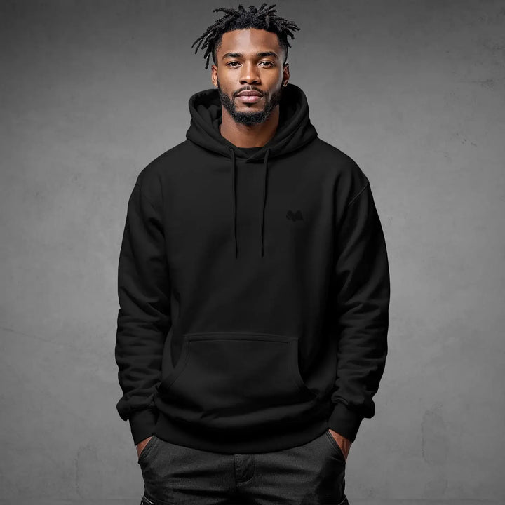 Alt Tag: Iconic Streetwear Hoodie DR669 black organic cotton pullover hoodie for men, front view model wearing streetwear sweatshirt